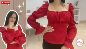 Blusa elegante con mangas abullonadas